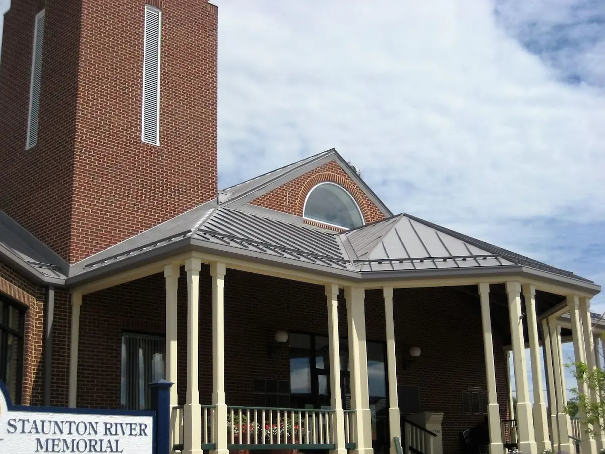 Skilled roofing craftsmen working on a residential roof in Hammville